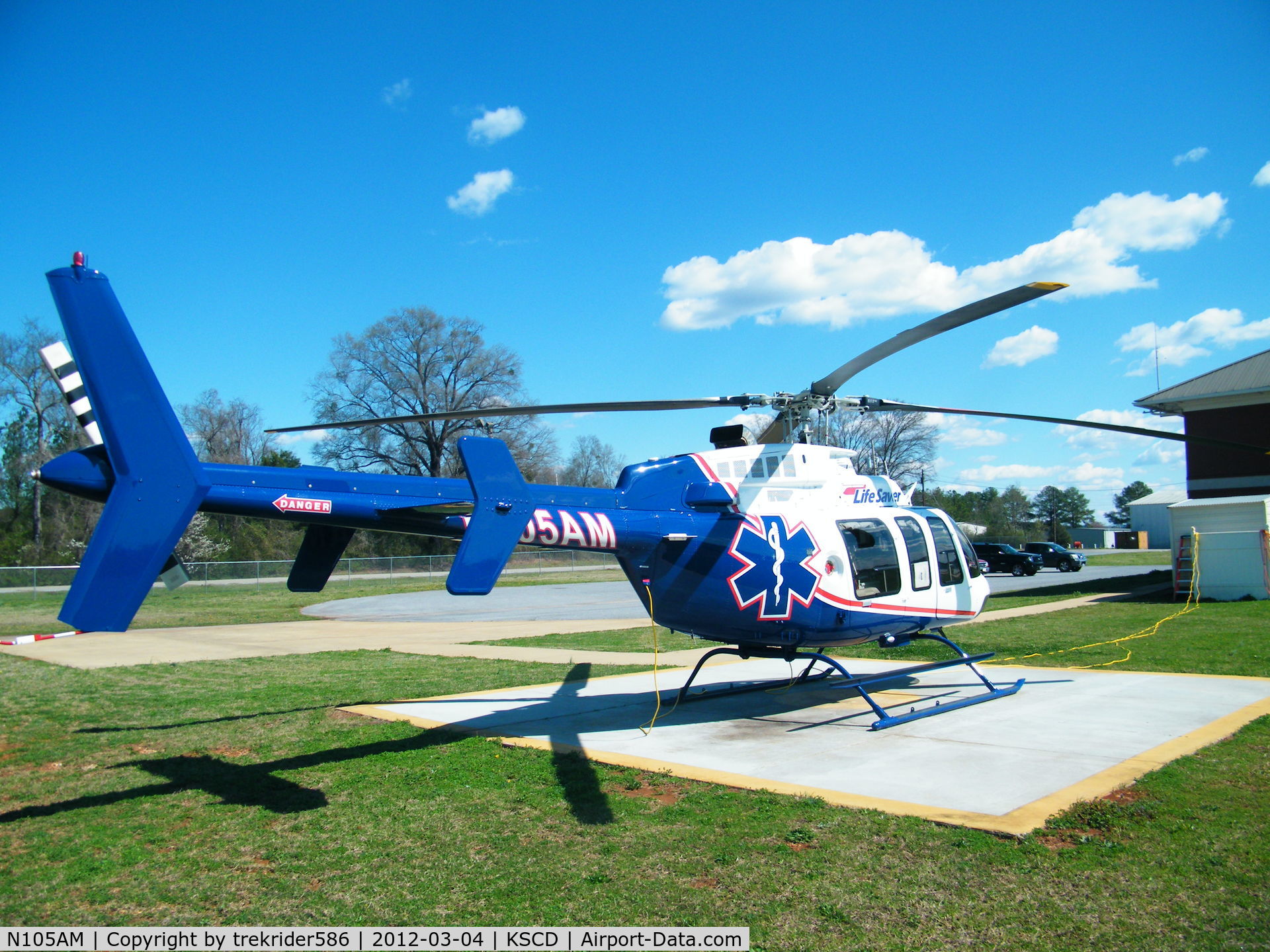 N105AM, 2010 Bell 407 C/N 54024, on station