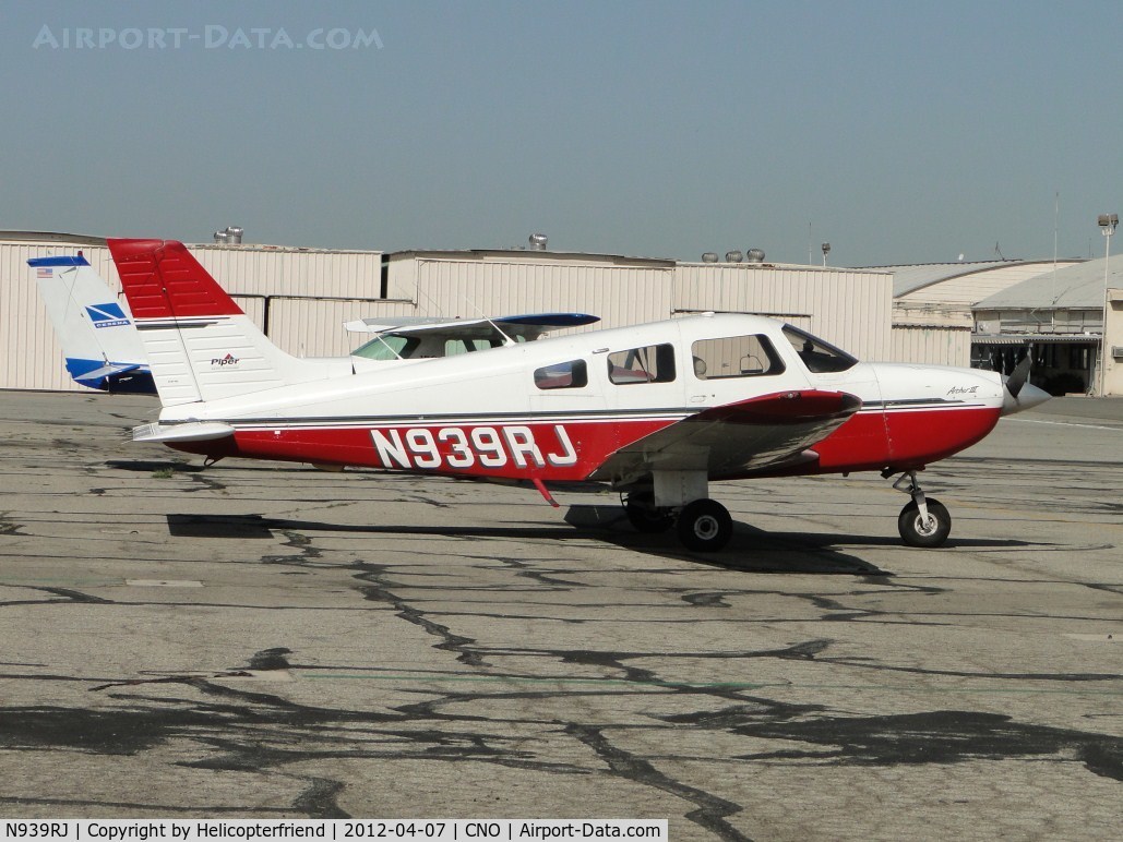 N939RJ, 1998 Piper PA-28-181 C/N 2843136, Parked south of the paint shop