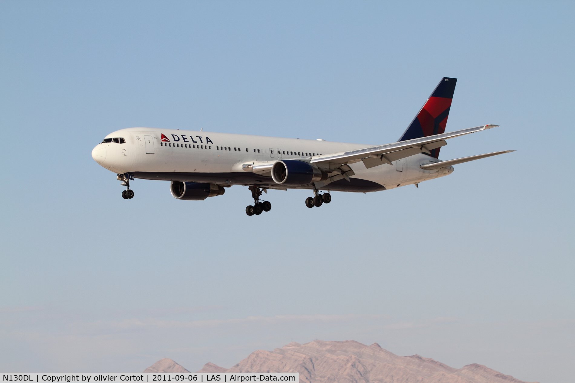 N130DL, 1988 Boeing 767-332 C/N 24080, 767 over nevada's moutains