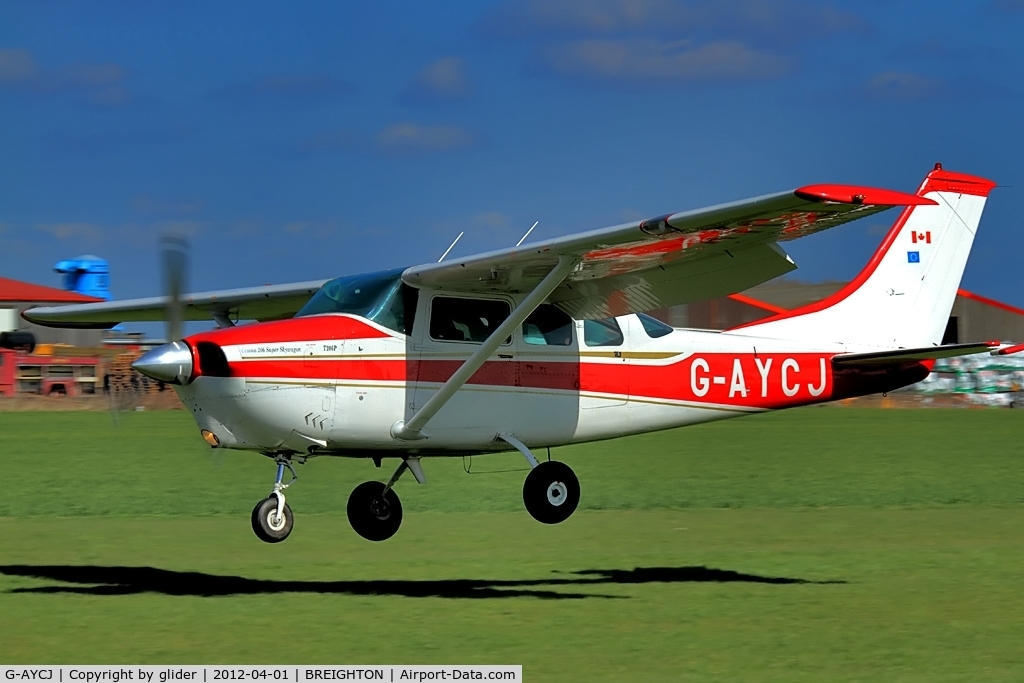 G-AYCJ, 1968 Cessna TP206D Turbo Super Skylane C/N T206-0552, Canadian flag on the tail!