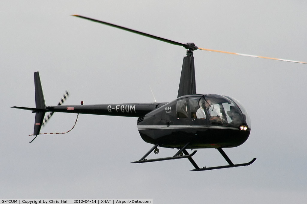 G-FCUM, 2007 Robinson R44 Raven II C/N 11723, Ferrying racegoers into Aintree for the 2012 Grand National