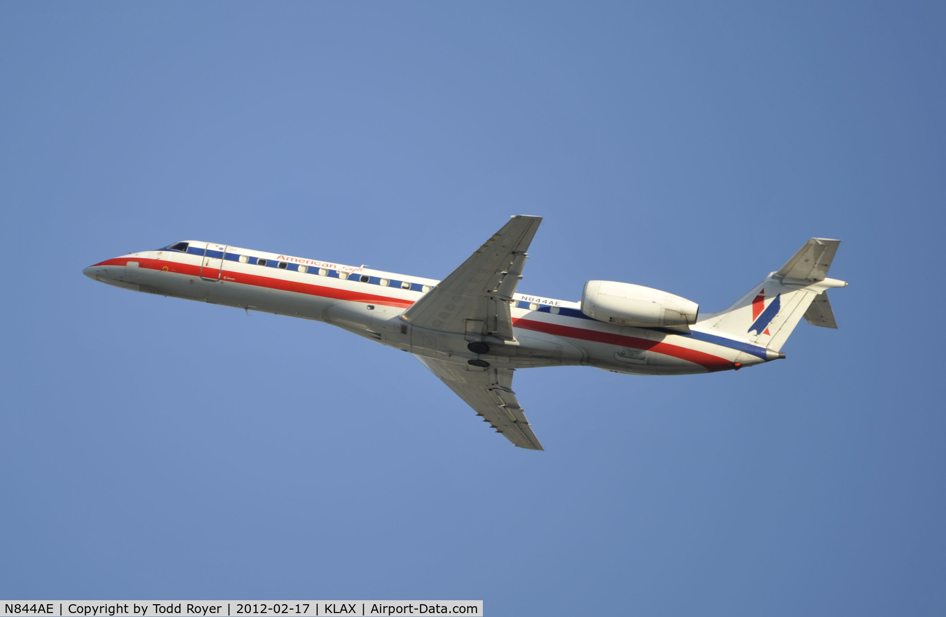 N844AE, 2003 Embraer ERJ-140LR (EMB-135KL) C/N 145682, Departing LAX on 25R