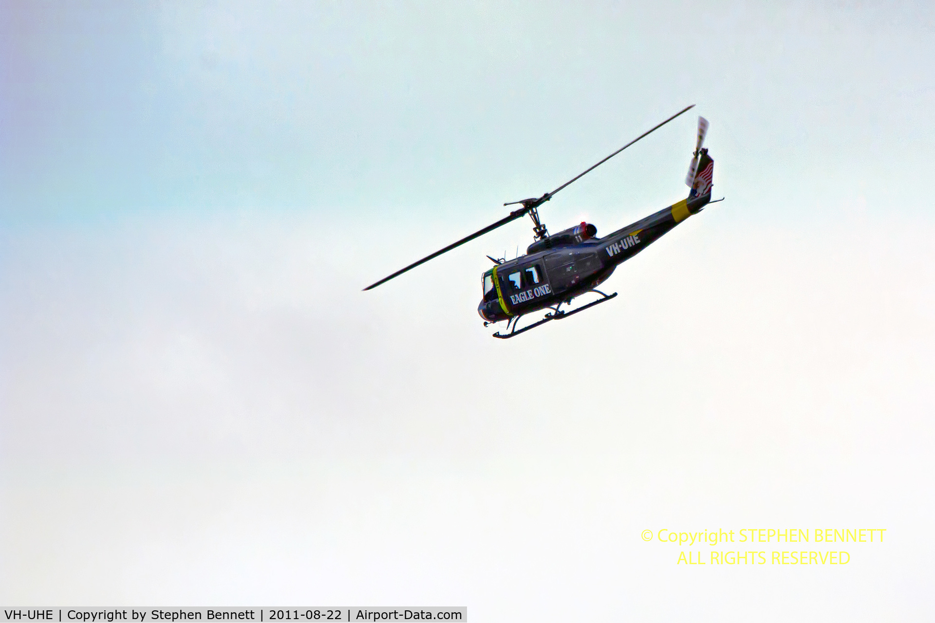 VH-UHE, 1966 Bell UH-1H Iroquois C/N 5995, Banking in an early morning sky above Tuggerah NSW, Australia