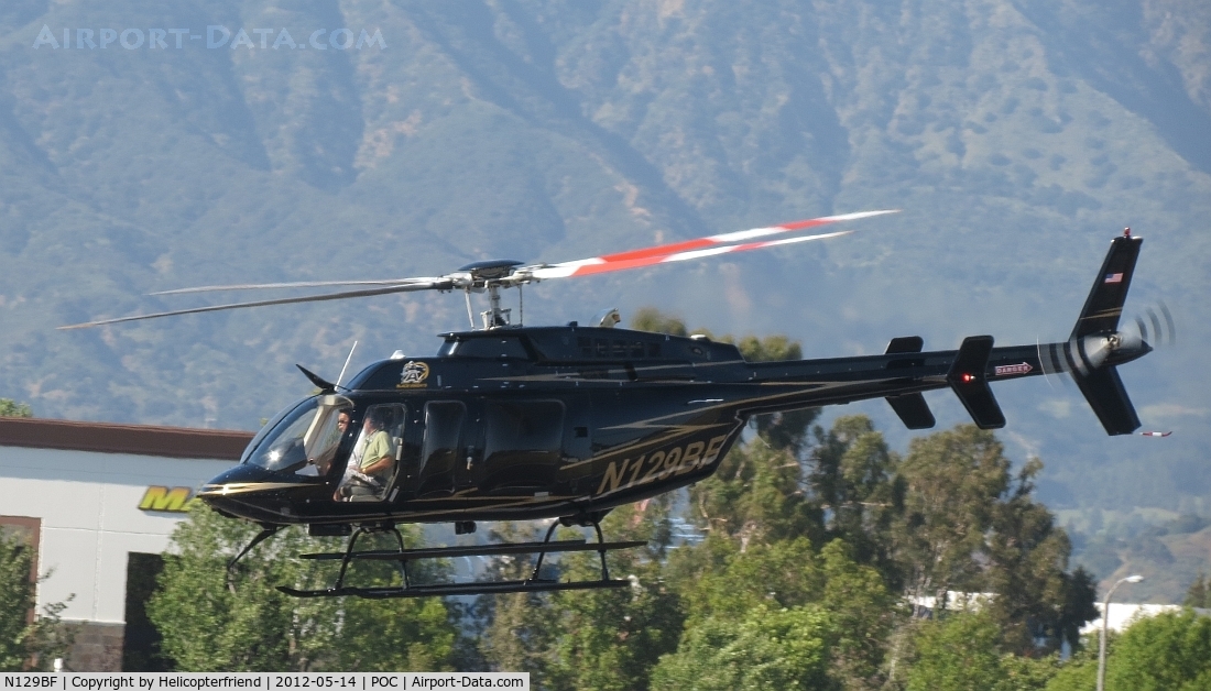 N129BF, 2007 Bell 407 C/N 53756, Slowing over runway 26L