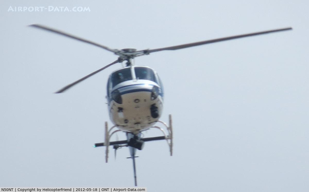 N50NT, 2011 Eurocopter AS-350B-2 Ecureuil Ecureuil C/N 7169, With permission, heading south crossing both active runways