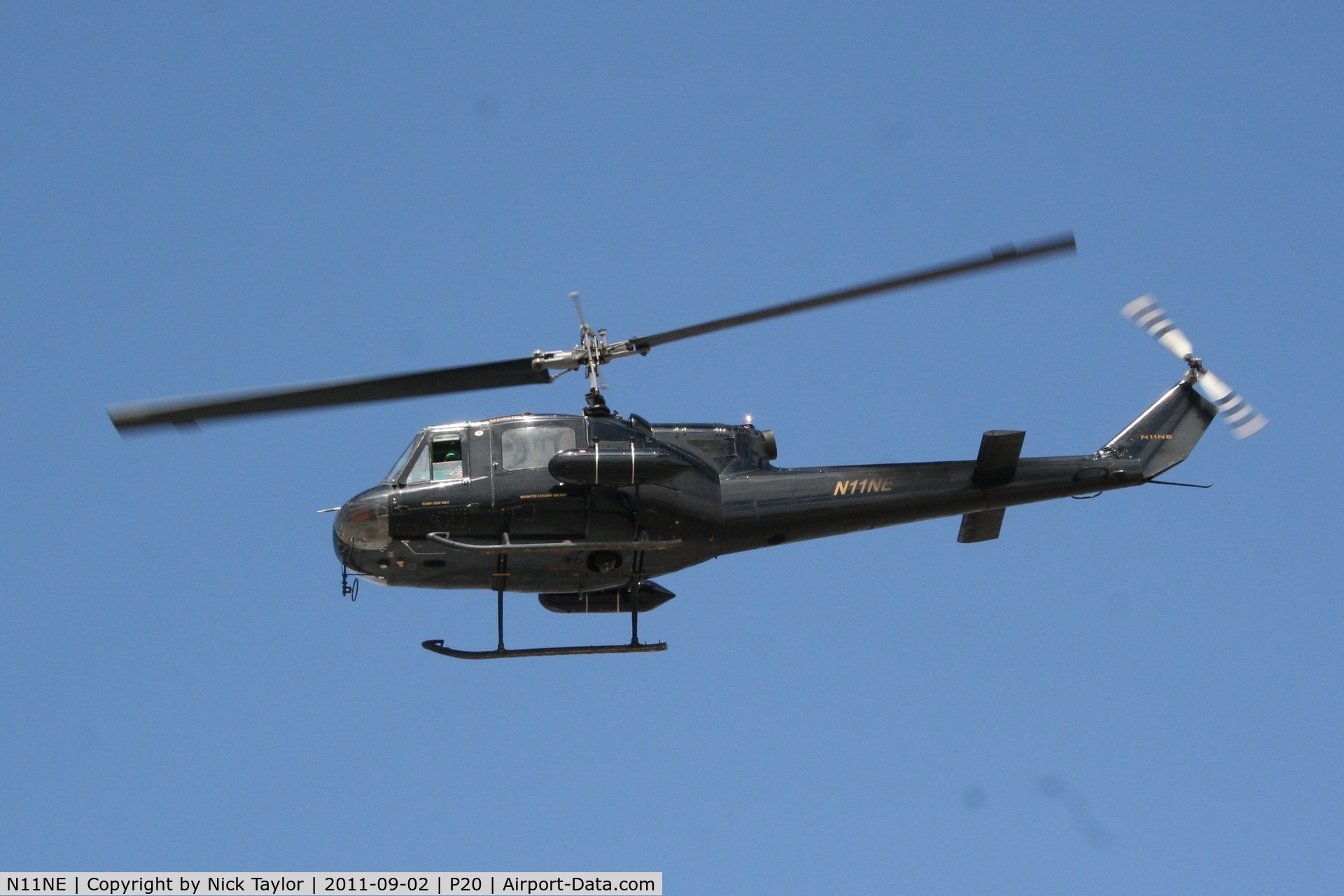 N11NE, 2001 Bell UH-1B C/N 63-13086, Departing after fueling up