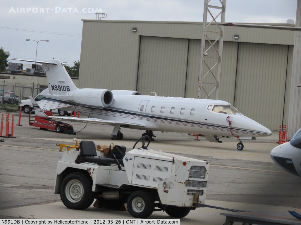 N991DB, 2000 Learjet 60 C/N 177, Has just been brought out and still hooked to the tow machine