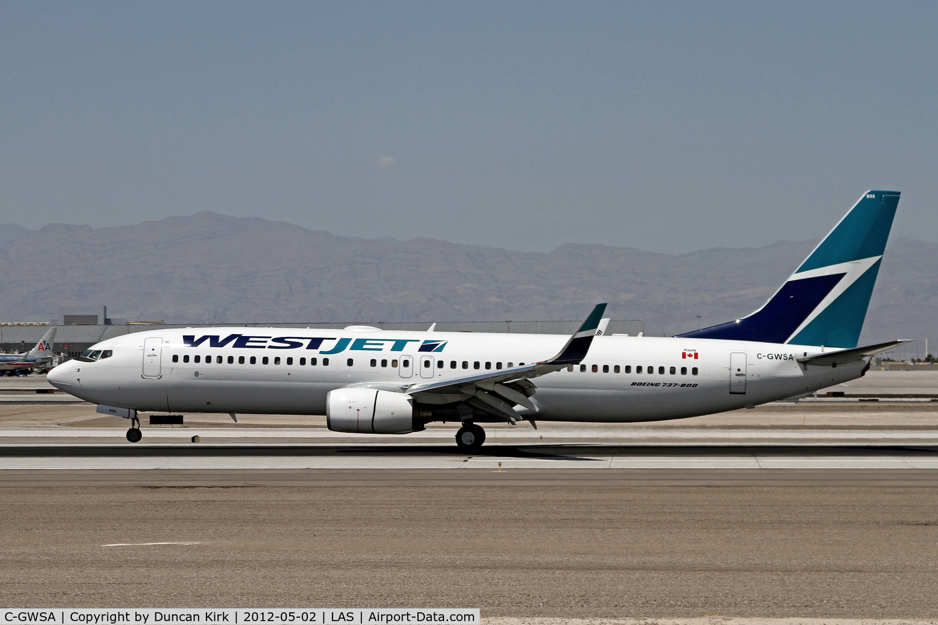 C-GWSA, 2005 Boeing 737-8CT C/N 34153, Touching down at Las Vegas