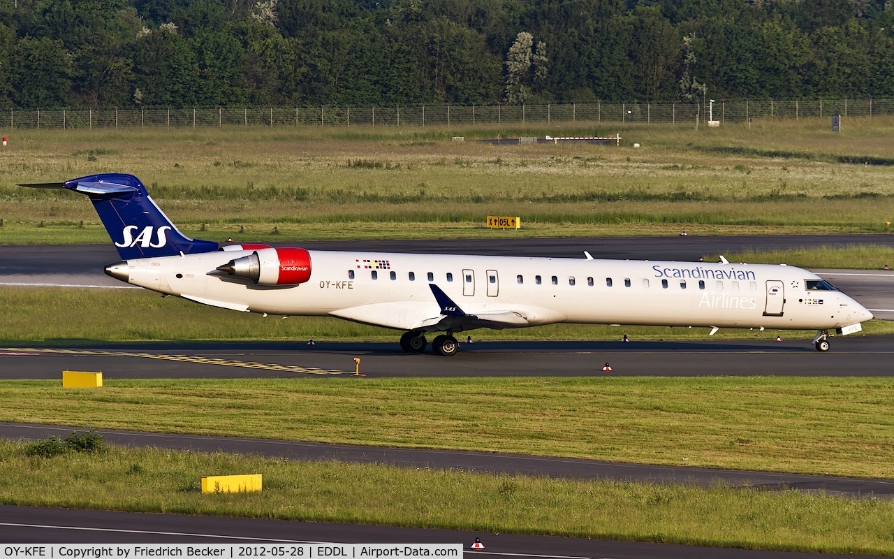 OY-KFE, 2009 Bombardier CRJ-900ER (CL-600-2D24) C/N 15224, taxying to the active
