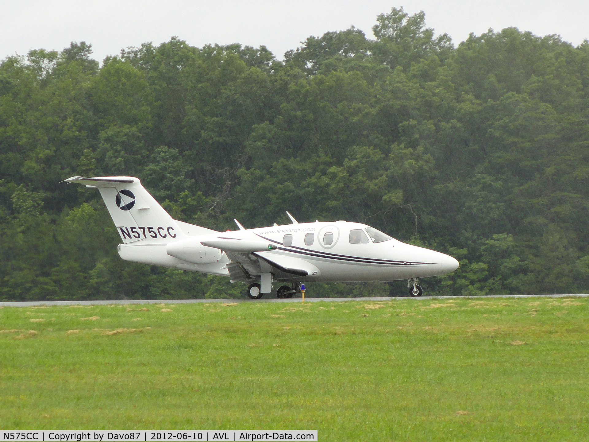 N575CC, 2007 Eclipse Aviation Corp EA500 C/N 000075, Landing at Asheville, NC airport in the rain on June 10, 2012.