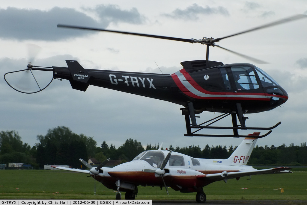 G-TRYX, 2005 Enstrom 480B C/N 5083, at the Air Britain flyin 2012