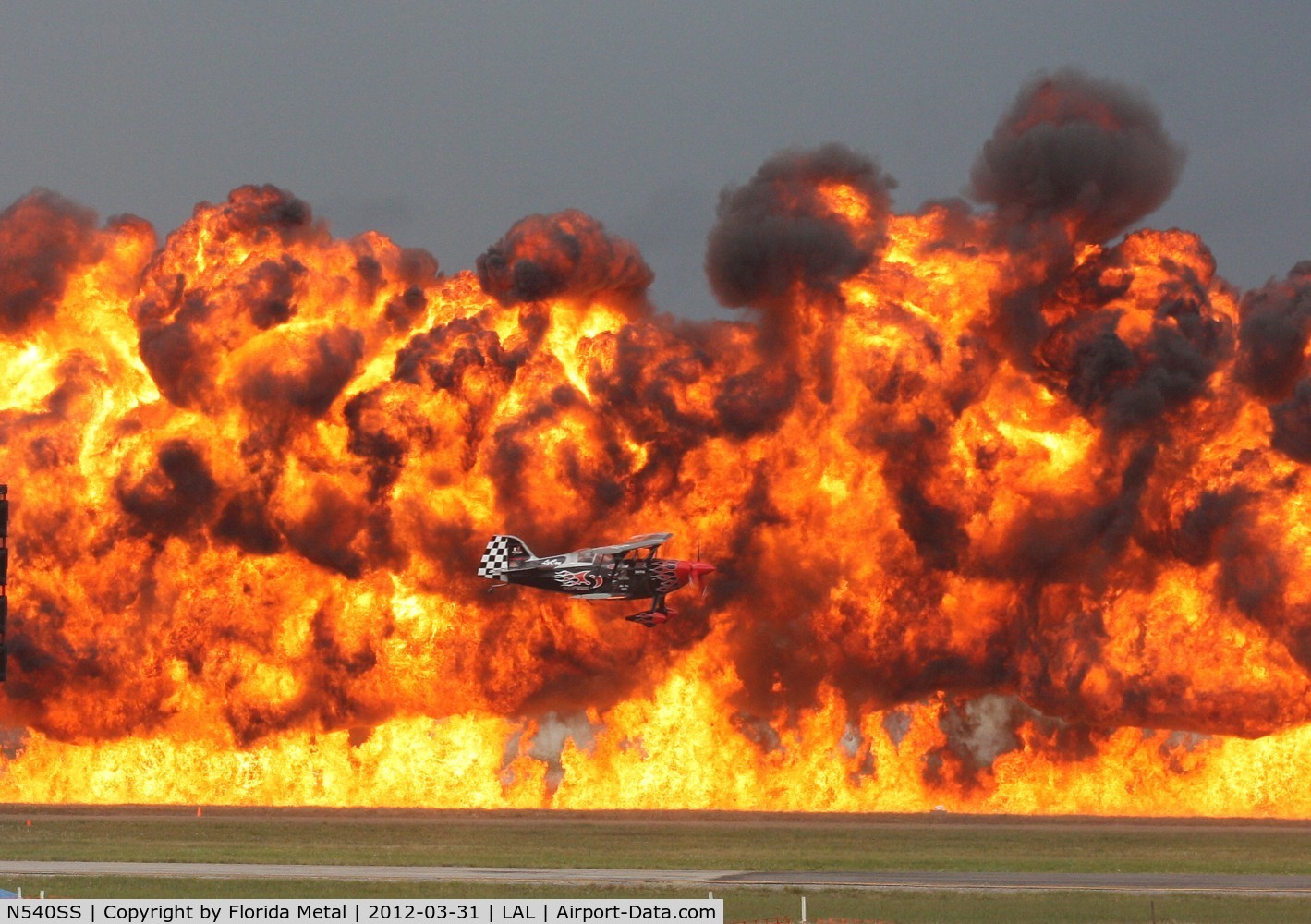 N540SS, 2011 Pitts S-2S Special C/N 006, Slip Stewart flying in front of Wall of Fire