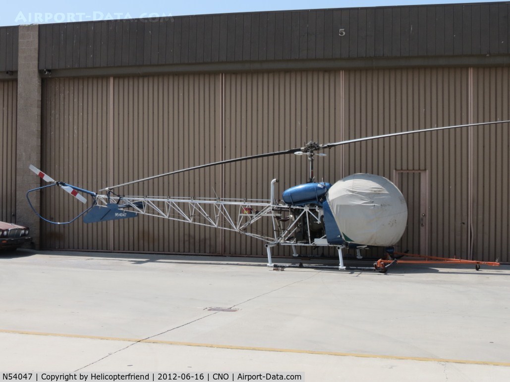 N54047, 1967 Bell 47G C/N 002, Covered and parked near hanger