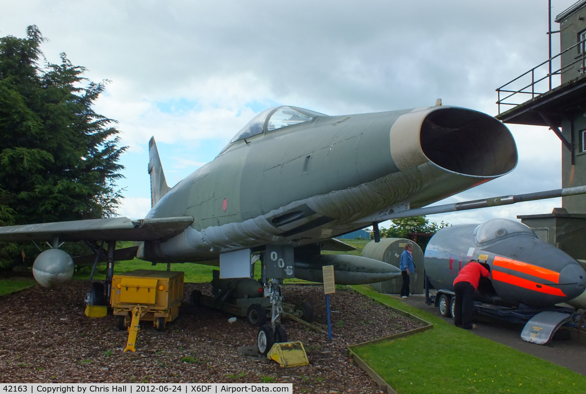 42163, North American F-100D Super Sabre C/N 223-43, Former French Air Force F-100D now painted in USAF markings as 54-2163 and dedicated to the US Air National Guard and is depicted as one flown by Capt. John M. Haley, 174th TFS, Iowa Air National Guard, during the squadron’s tour in Vietnam.