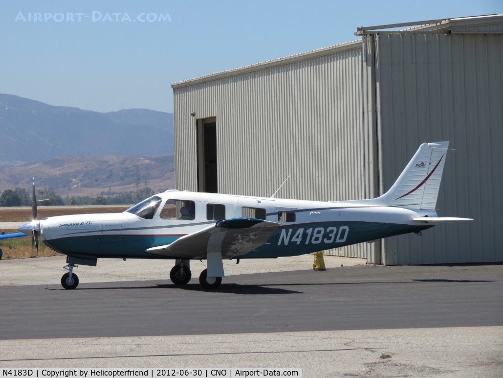 N4183D, 2001 Piper PA-32R-301T Turbo Saratoga C/N 3257203, Parked outside a hanger