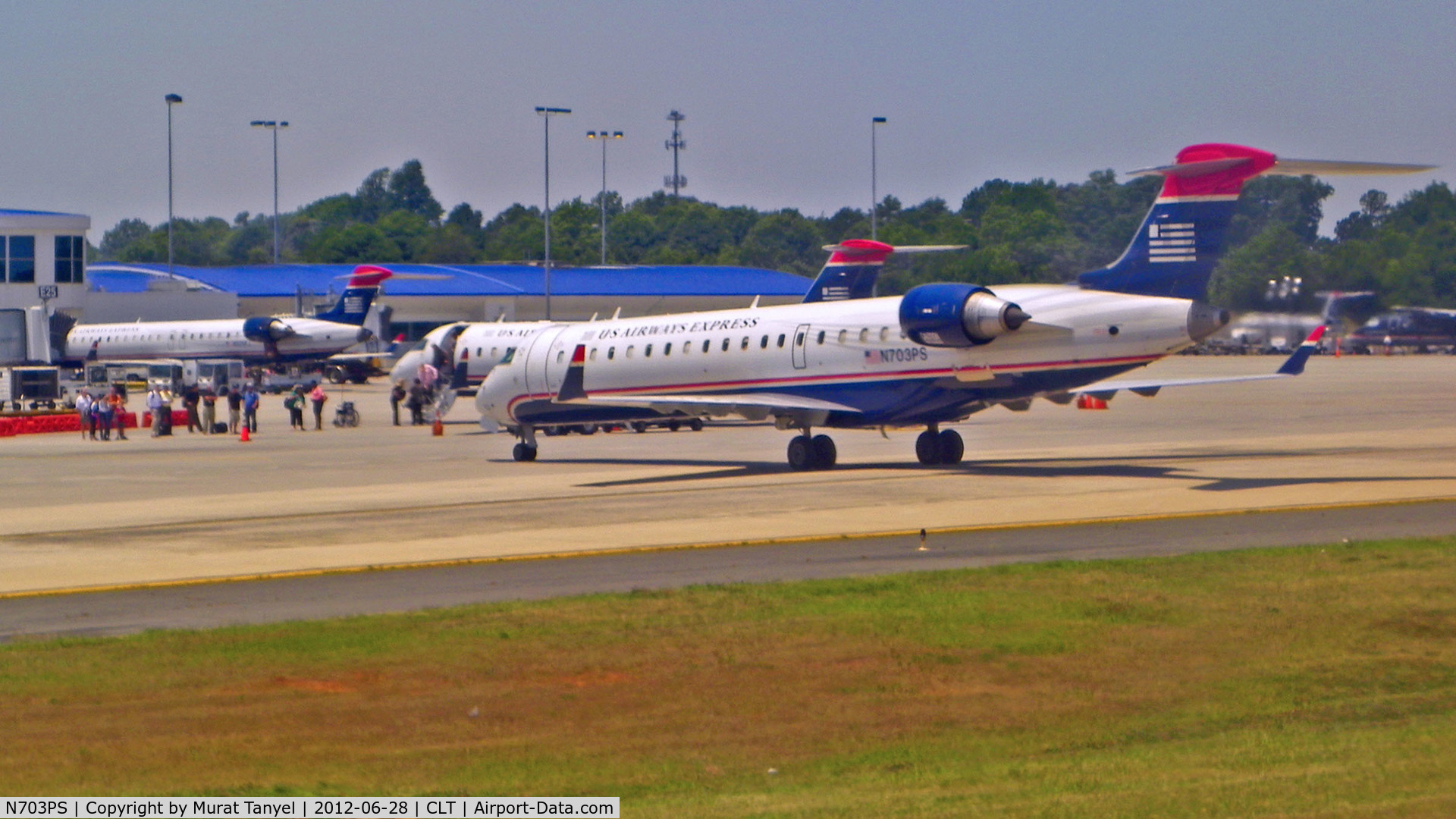 N703PS, 2004 Bombardier CRJ-701 (CL-600-2C10) Regional Jet C/N 10137, Parked at CLT