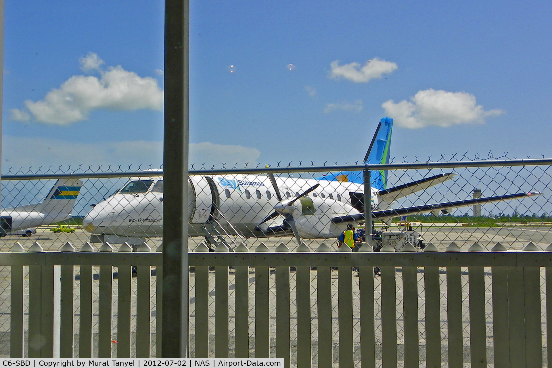 C6-SBD, 1985 Saab-Fairchild SF340 C/N 340A-021, Behind bars at Nassau Intl