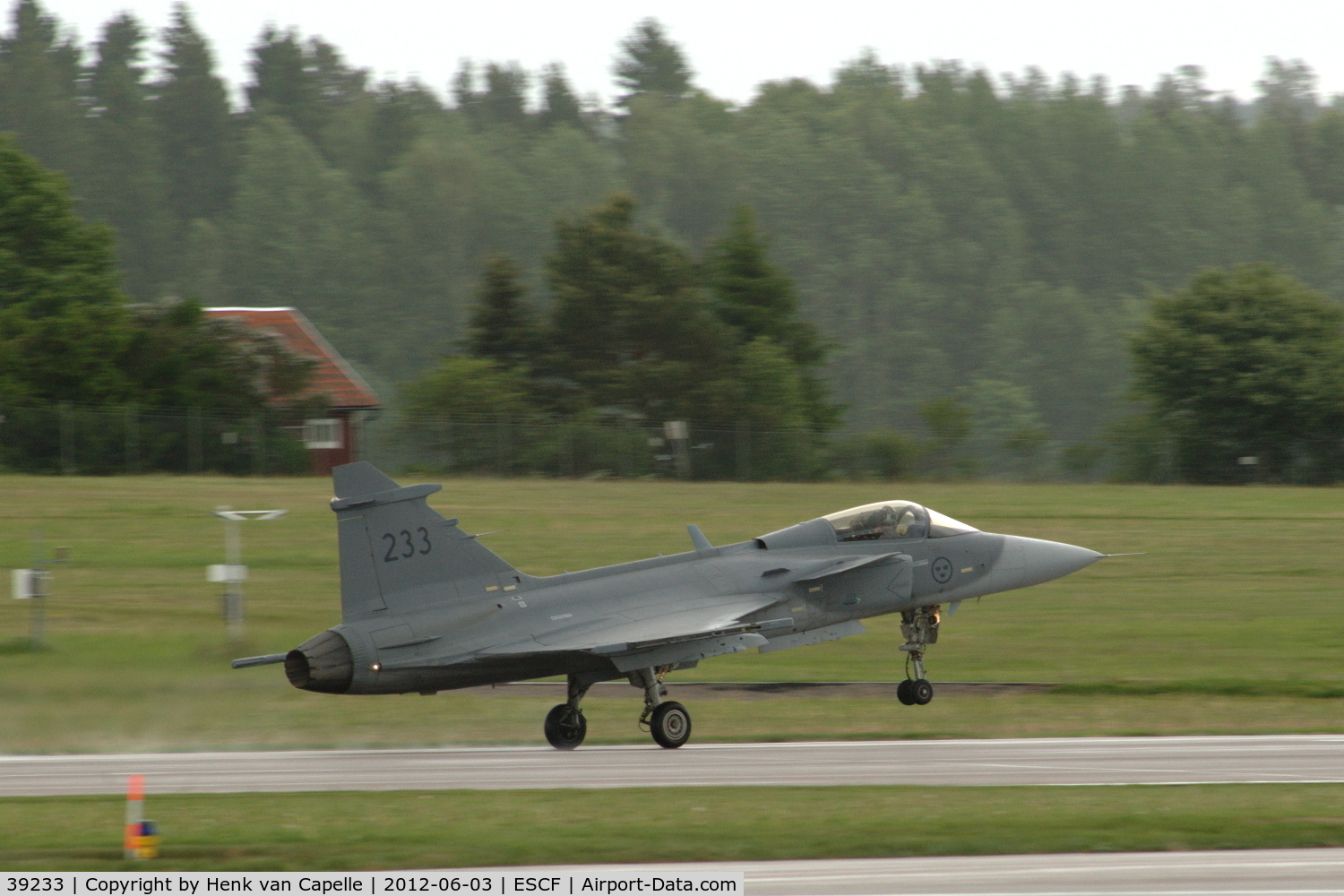 39233, Saab JAS-39C Gripen C/N 39233, Saab Gripen rotating for take-off at Malmen Air Base, Sweden.