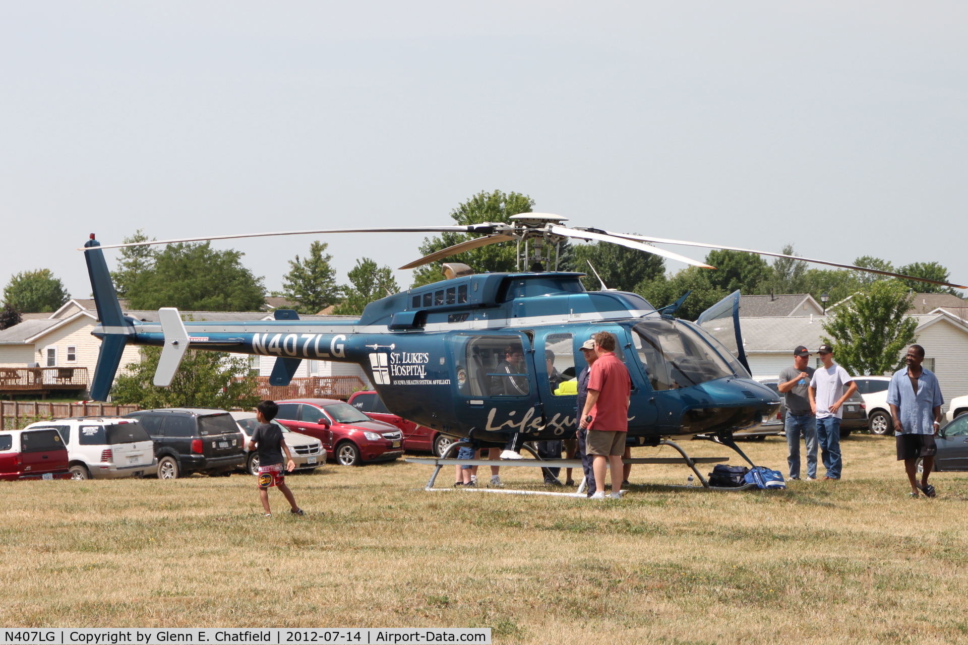 N407LG, 1997 Bell 407 C/N 53143, On display at North Liberty, IA during grand opening of local shopping center.