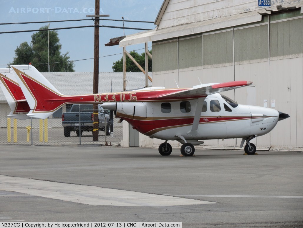N337CG, 1973 Cessna T337G Turbo Super Skymaster C/N P3370143, Parked at a hanger