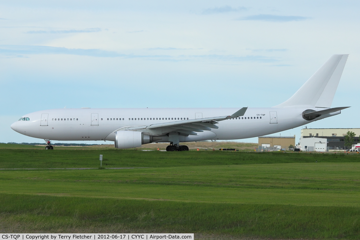 CS-TQP, 1998 Airbus A330-202 C/N 211, All White A330 at Calgary