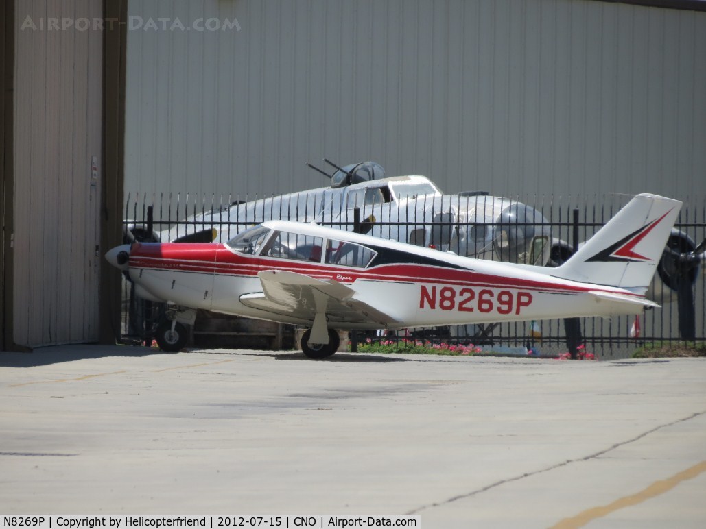 N8269P, 1963 Piper PA-24-250 Comanche C/N 24-3522, Parked at a hanger