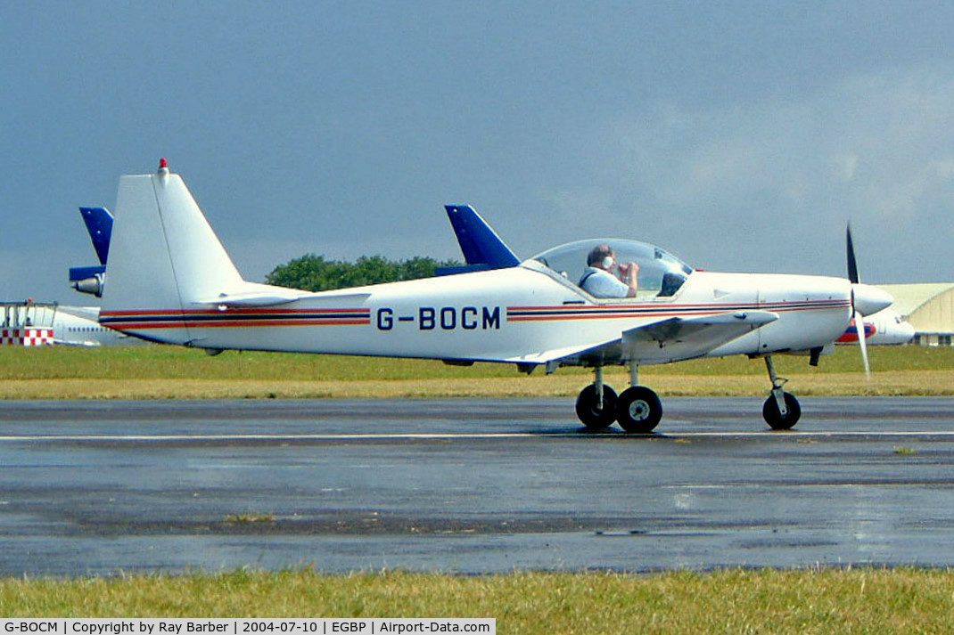 G-BOCM, 1986 Slingsby T-67C Firefly C/N 2036, Slingsby T.67C Firefly [2036] Kemble~G 10/07/2004. Seen here taxing for fuel.
