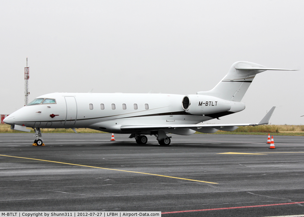 M-BTLT, 2005 Bombardier Challenger 300 (BD-100-1A10) C/N 20042, Parked near the control tower...