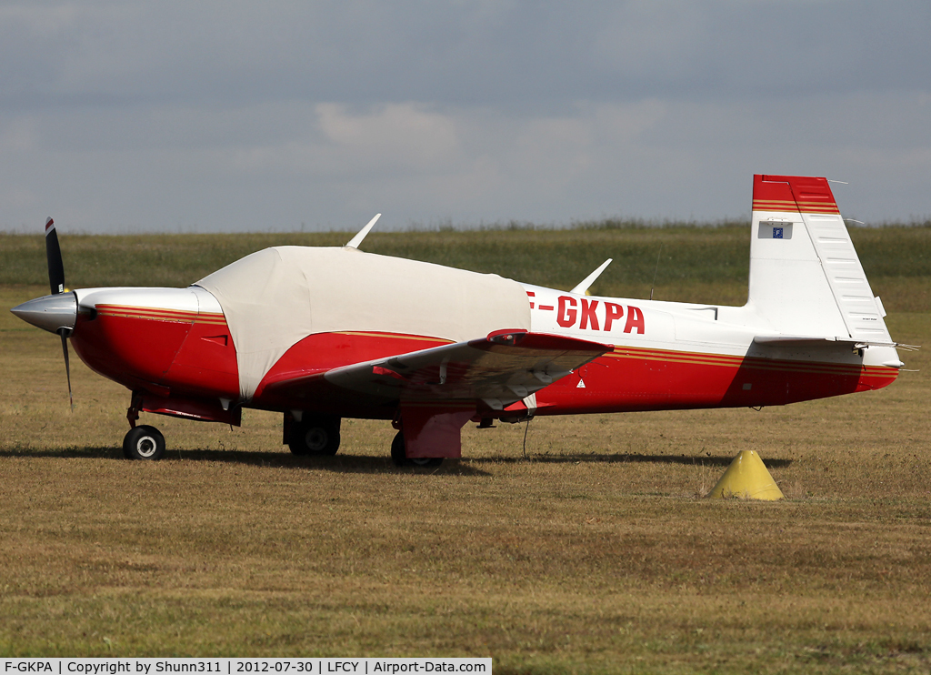 F-GKPA, Mooney M20J 201 C/N 24-3166, Parked in the grass...