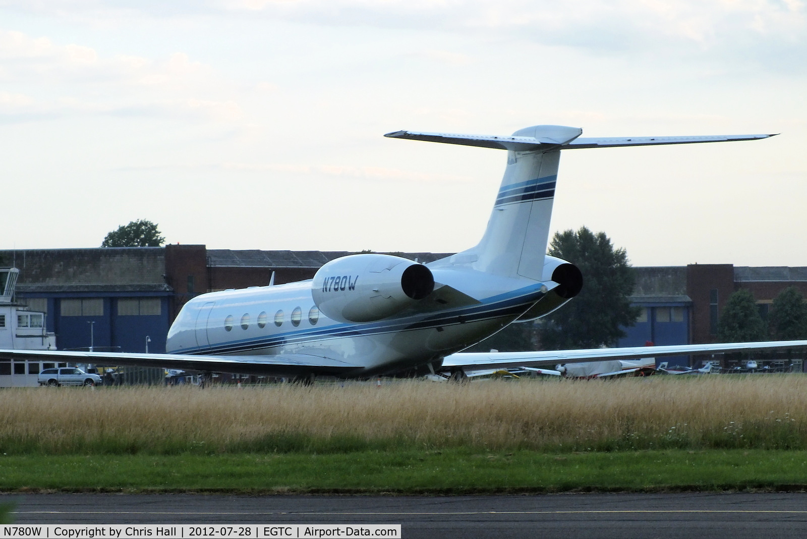N780W, 1997 Gulfstream Aerospace G-V C/N 530, one of several bizjets parked at Cranfield with visitors for the opening of the London 2012 Olympic games