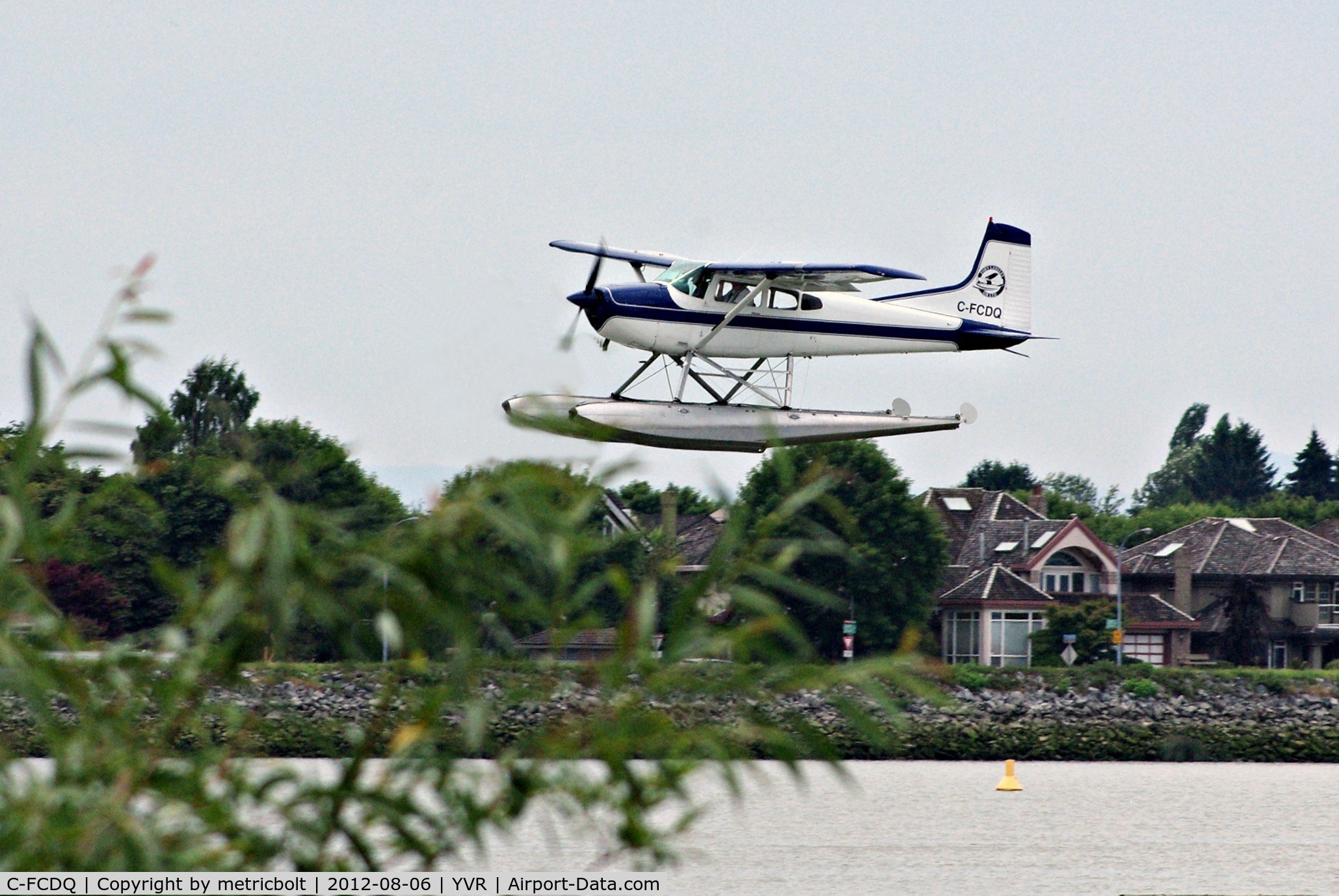 C-FCDQ, 1970 Cessna 180H Skywagon C/N 18052166, Landing on the Fraser River