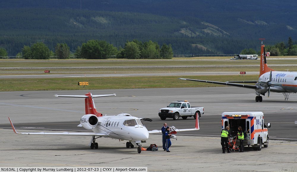 N163AL, Learjet Inc 31A C/N 053, On the ramp at Whitehorse, Yukon on a medevac mission.
