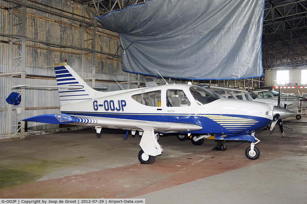 G-OOJP, 1993 Rockwell Commander 114B C/N 14567, in the civil hangar at RAF Kirknewton