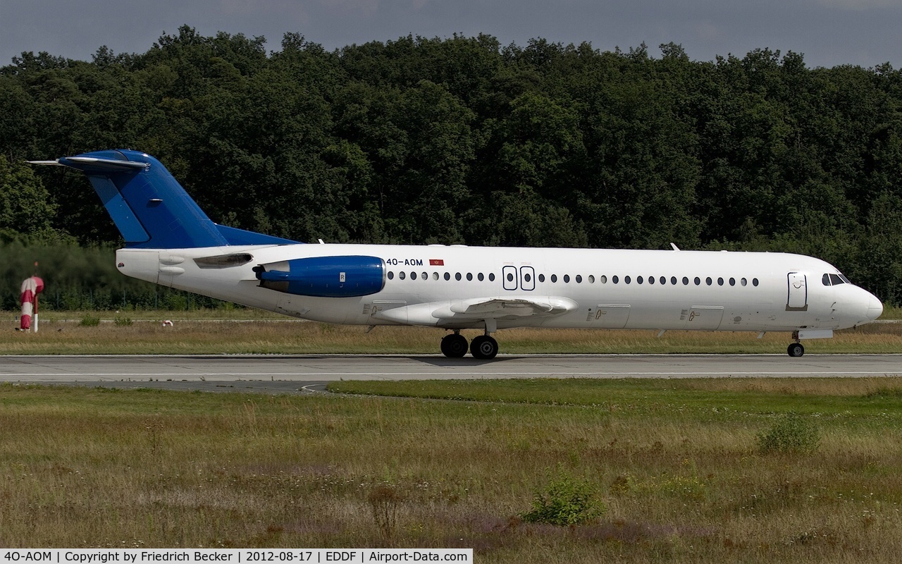 4O-AOM, 1990 Fokker 100 (F-28-0100) C/N 11321, departure from Frankfurt