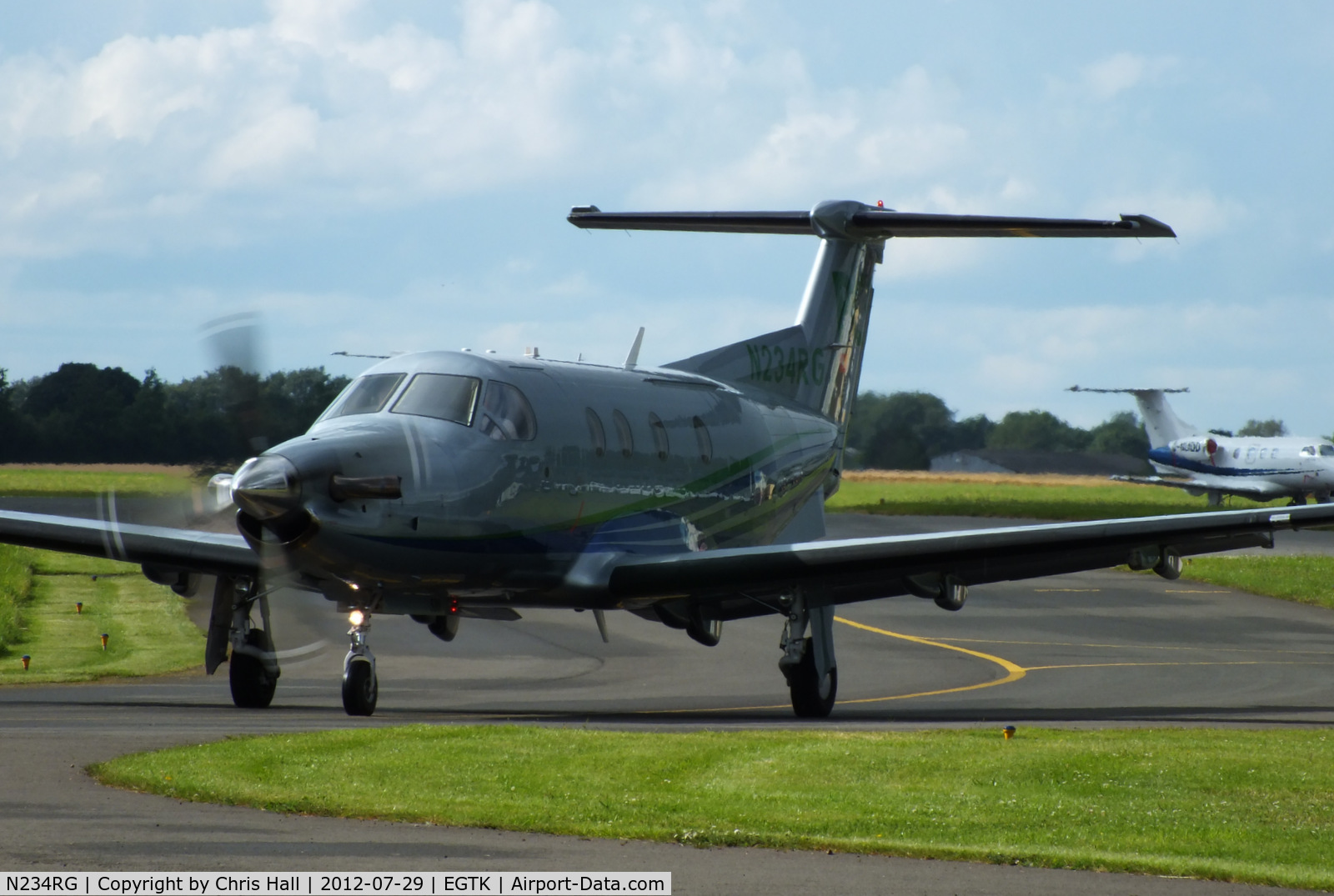 N234RG, 2003 Pilatus PC-12/45 C/N 520, taxiing of the main apron at Oxford, returning to its base at Belfast City Airport, NI