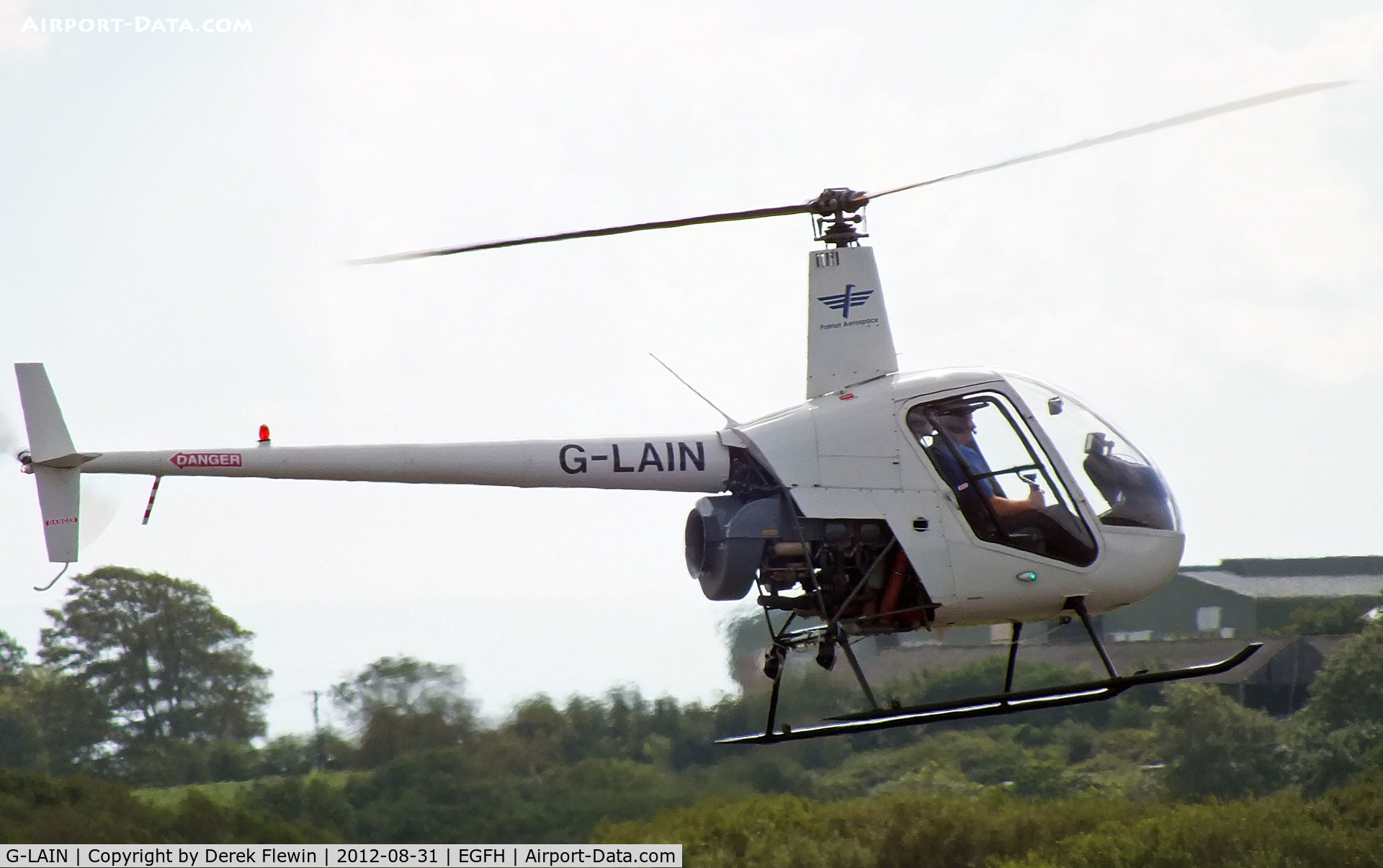 G-LAIN, 1991 Robinson R22 Beta C/N 1992, Seen at EGFH.