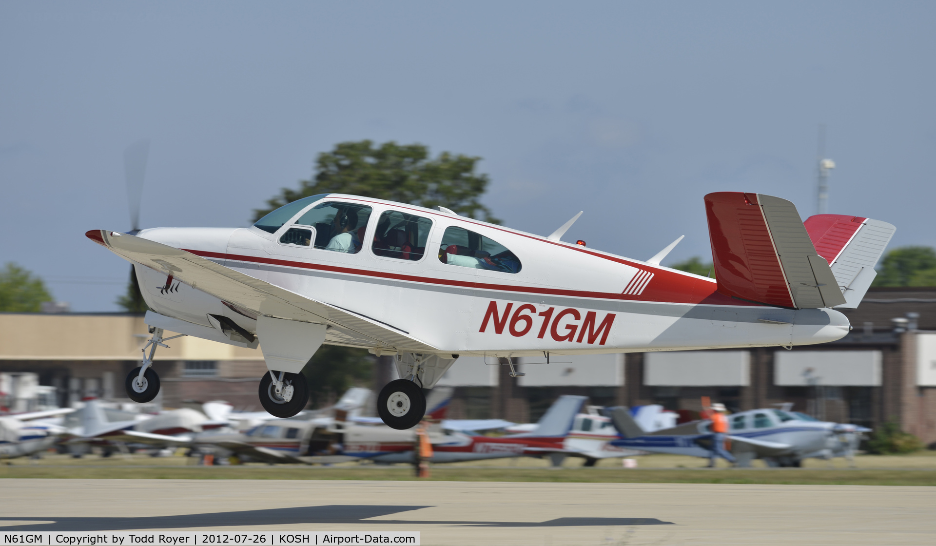 N61GM, 1961 Beech N35 Bonanza C/N D-6665, Departing Airventure 2012