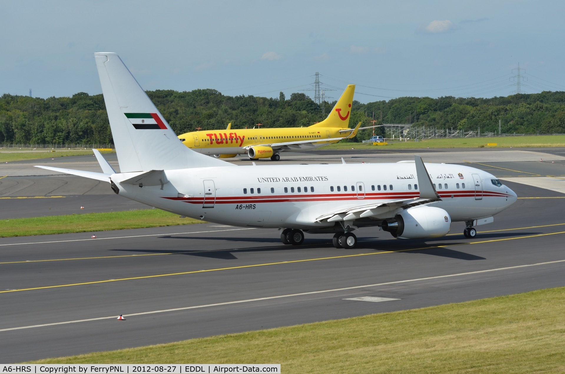 A6-HRS, Boeing 737-7E0 BBJ C/N 29251, Departing DUS after splash and dash.