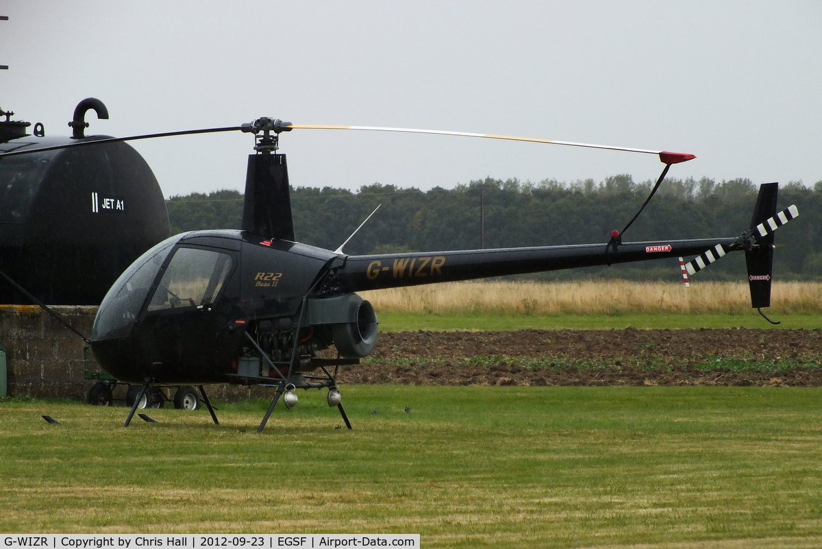 G-WIZR, 1998 Robinson R22 Beta II C/N 2799, at Peterborough Business Airport