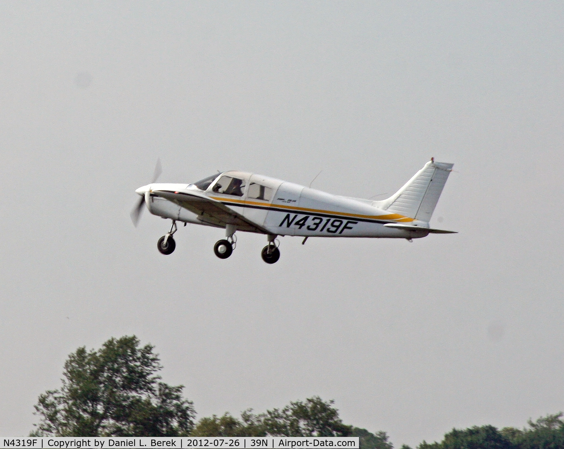 N4319F, 1976 Piper PA-28-140 C/N 28-7725007, A Piper Cherokee launches itself at Princeton Airport.