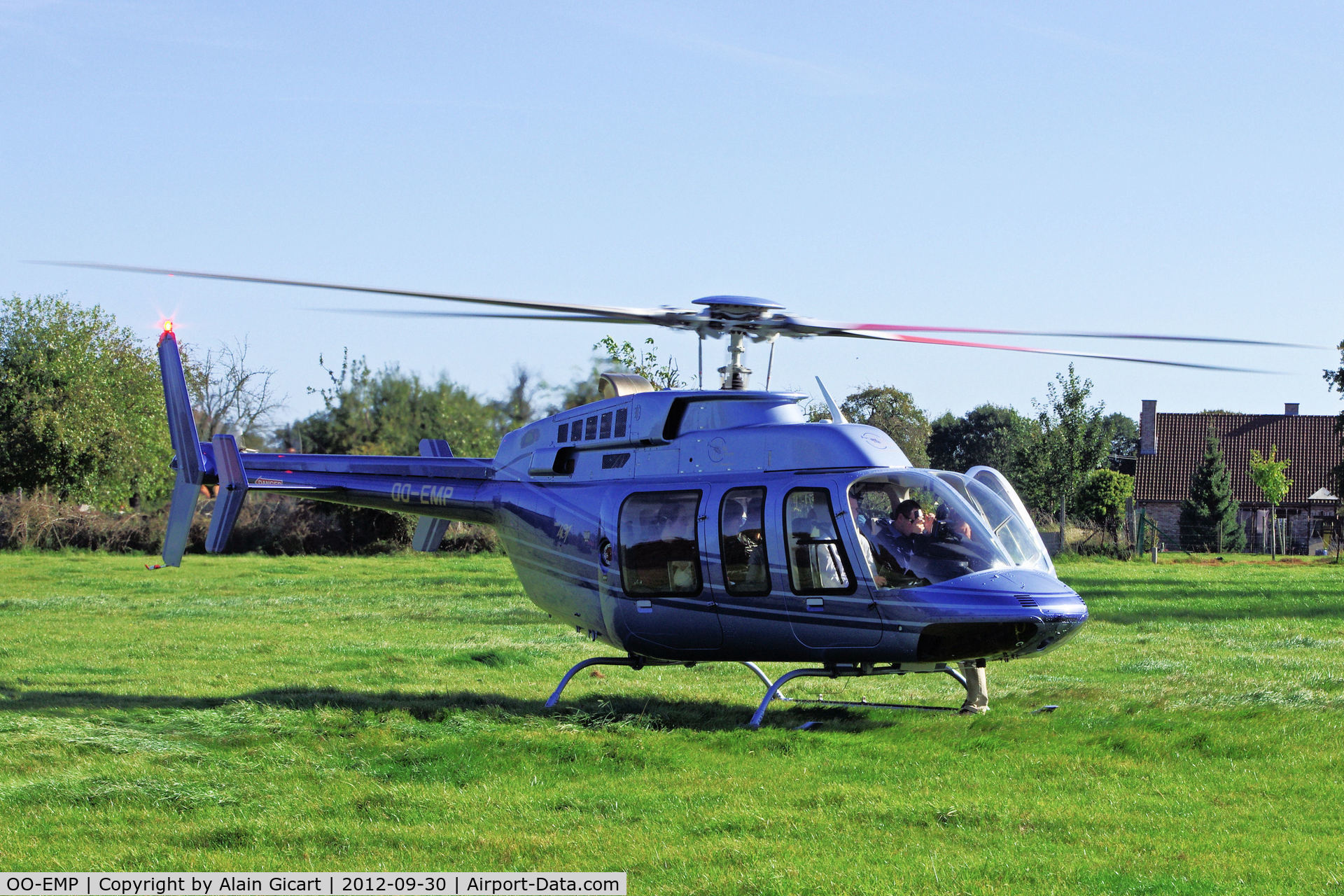 OO-EMP, 2005 Bell 407 C/N 53668, In the country.