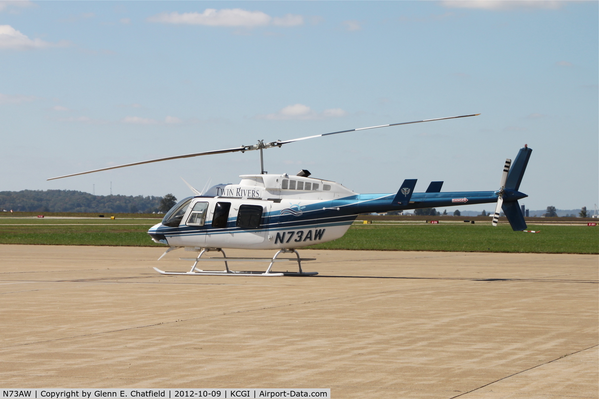 N73AW, 1995 Bell 206L-4 LongRanger IV LongRanger C/N 52115, Had to crawl behind bushes and shoot through the fence for this one!