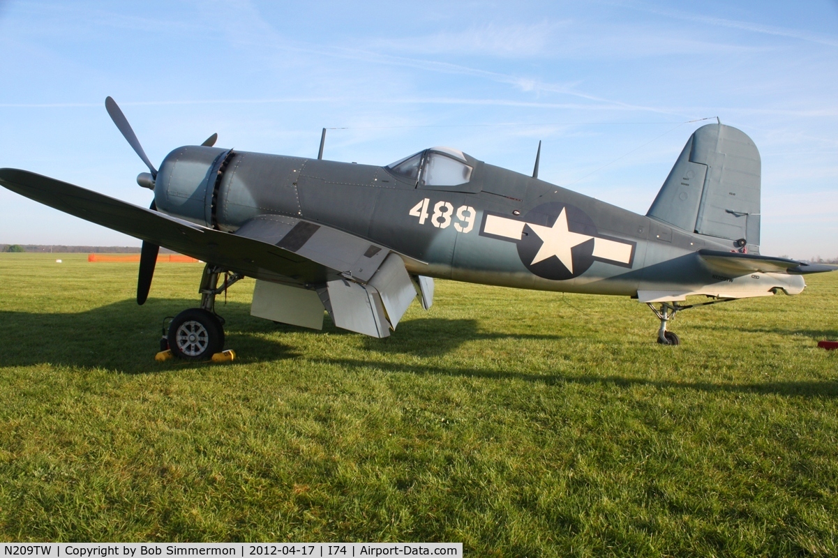 N209TW, Goodyear FG-1D Corsair C/N 3750, Dawn in the grass at Urbana, Ohio.  B-25 Gathering and Doolittle Reunion.