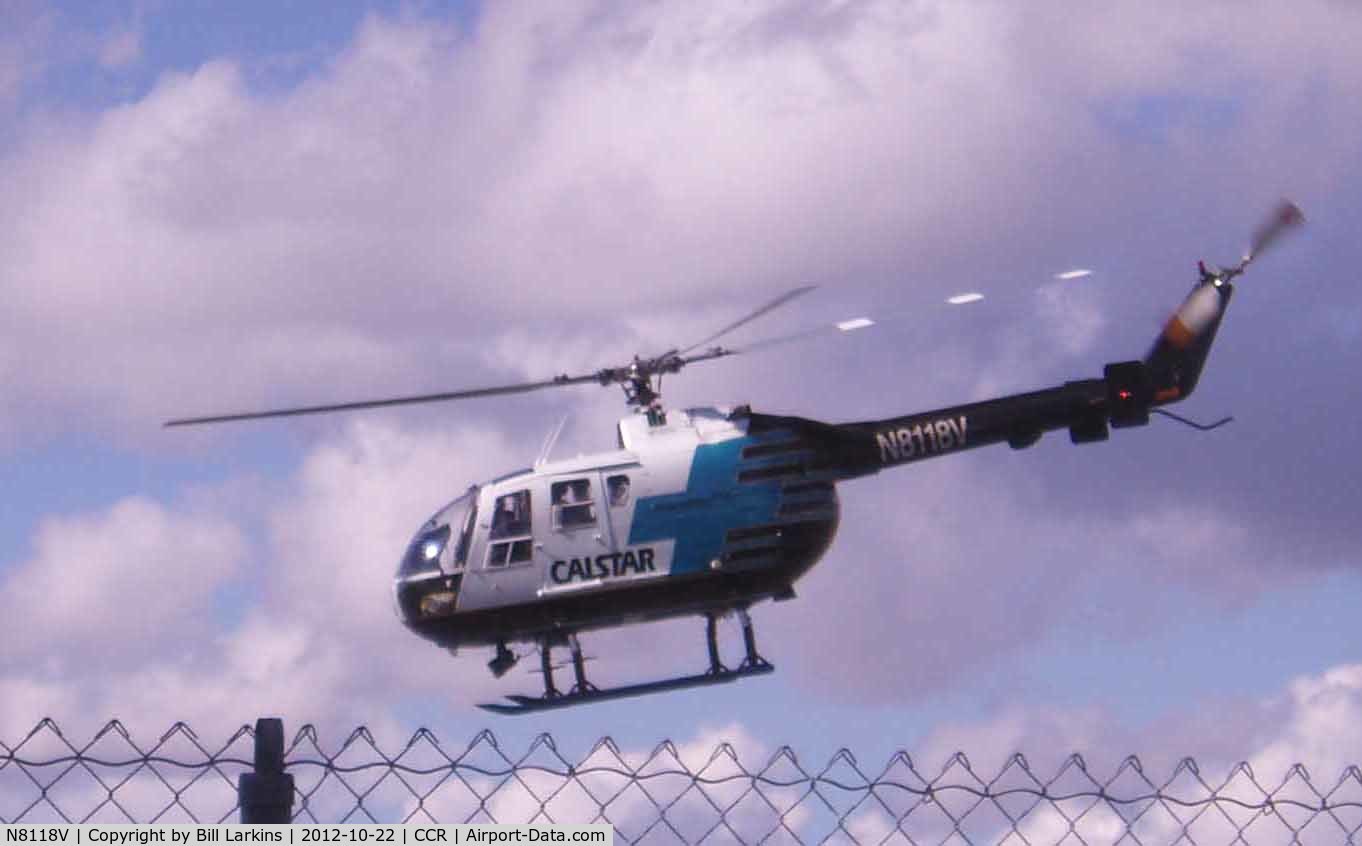 N8118V, MBB Bo-105LS A-3 C/N 2018, Taking off from their base near the Tower.