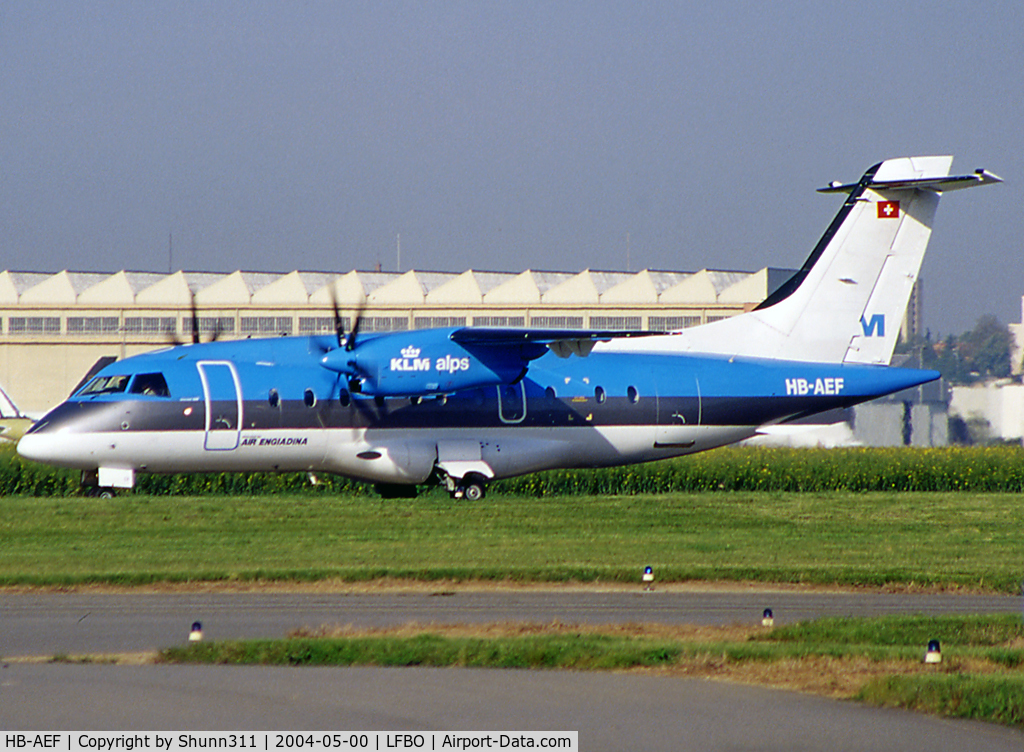 HB-AEF, 1994 Dornier 328-110 C/N 3017, Taxiing holding point rwy 32R for departure in basic KLM c/s with small Air Engiadina titles...