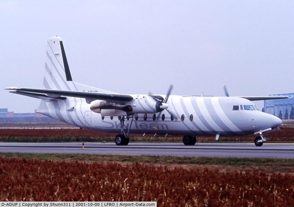 D-ADUP, 1985 Fokker F-27-500 Friendship C/N 10686, Taxiing holding point rwy 14L for departure in grey Skyteam c/s...