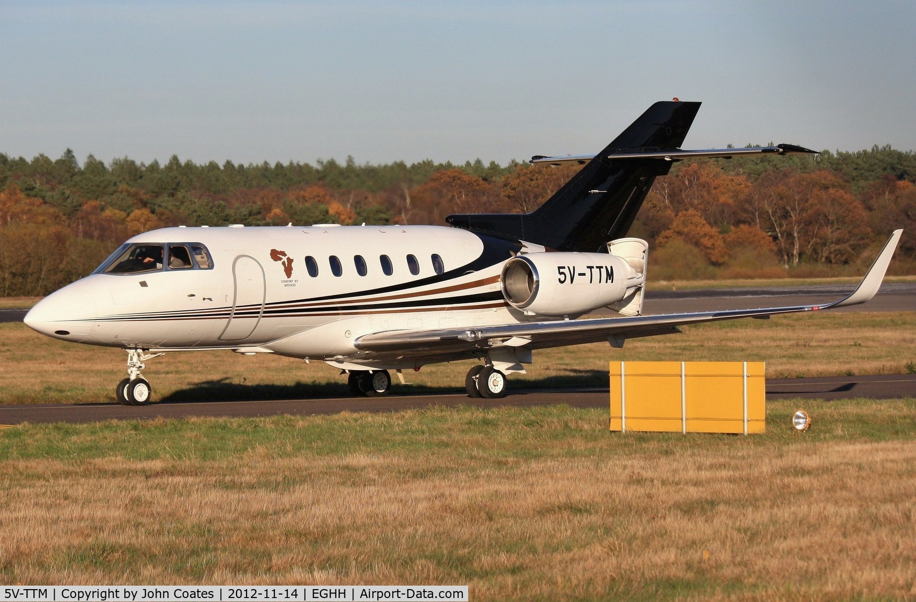 5V-TTM, 2003 Raytheon Hawker 800XP C/N 258632, Parting waggle of the air brakes on departure from JETS.
