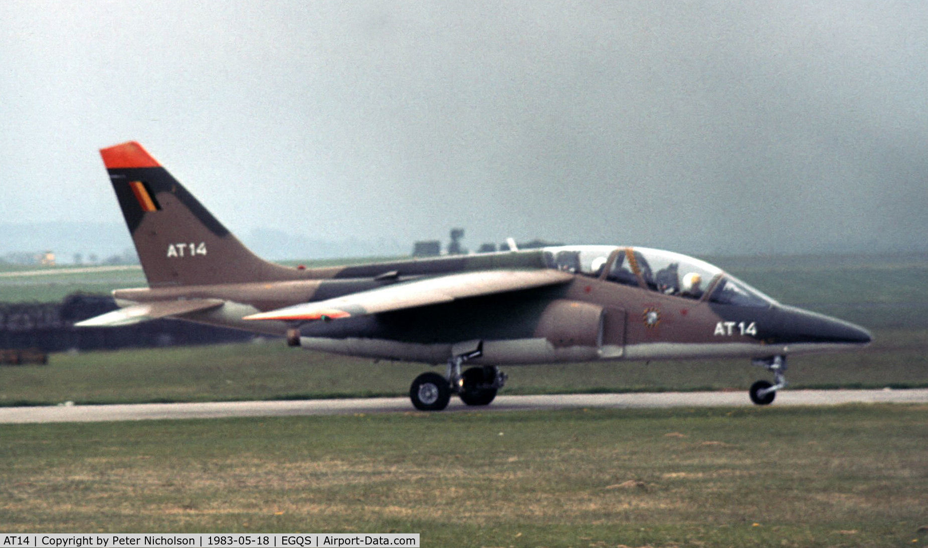 AT14, Dassault-Dornier Alpha Jet 1B C/N B14/1043, Belgian Air Force Advanced Flying School Alpha Jet taxying to Runway 23 at RAF Lossiemouth in the Summer of 1983