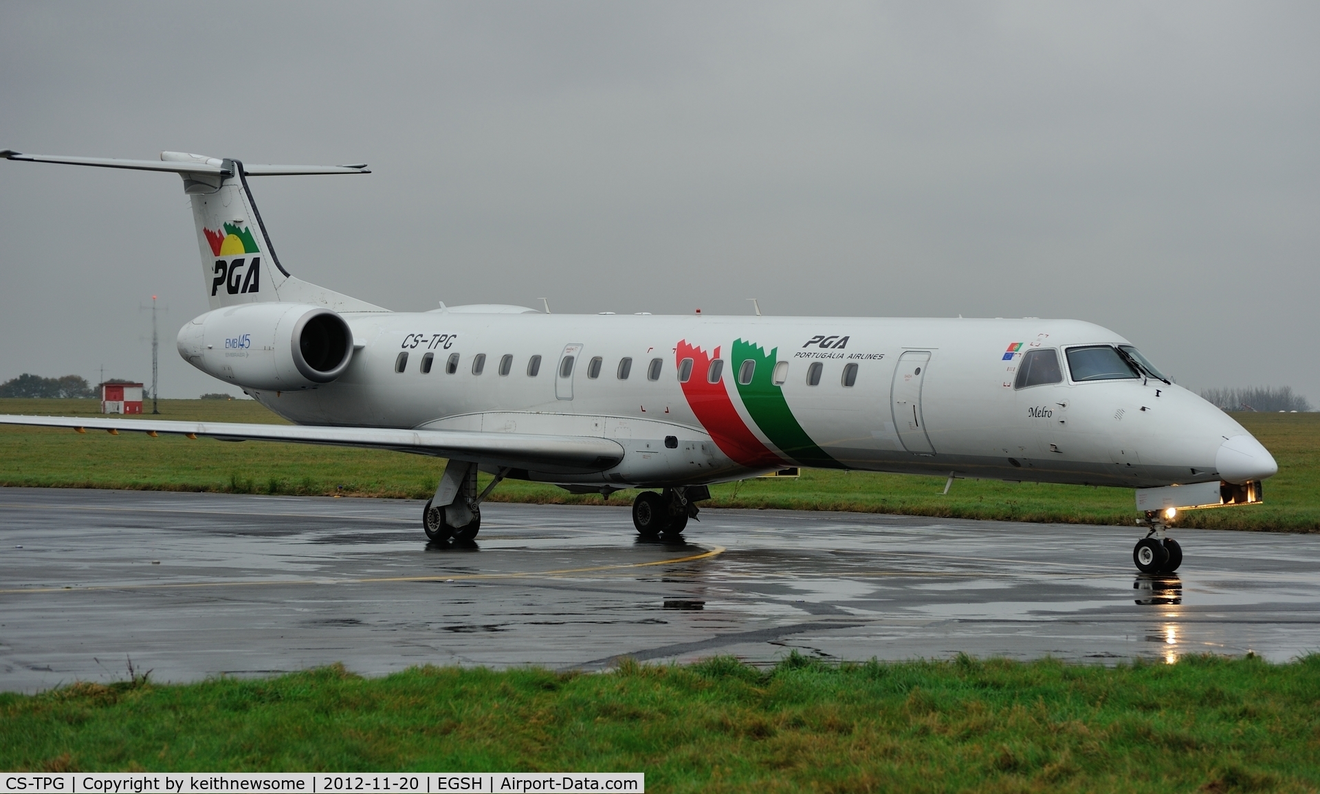 CS-TPG, 1997 Embraer EMB-145EP (ERJ-145EP) C/N 145014, Arriving, in the wet, for Air Livery.