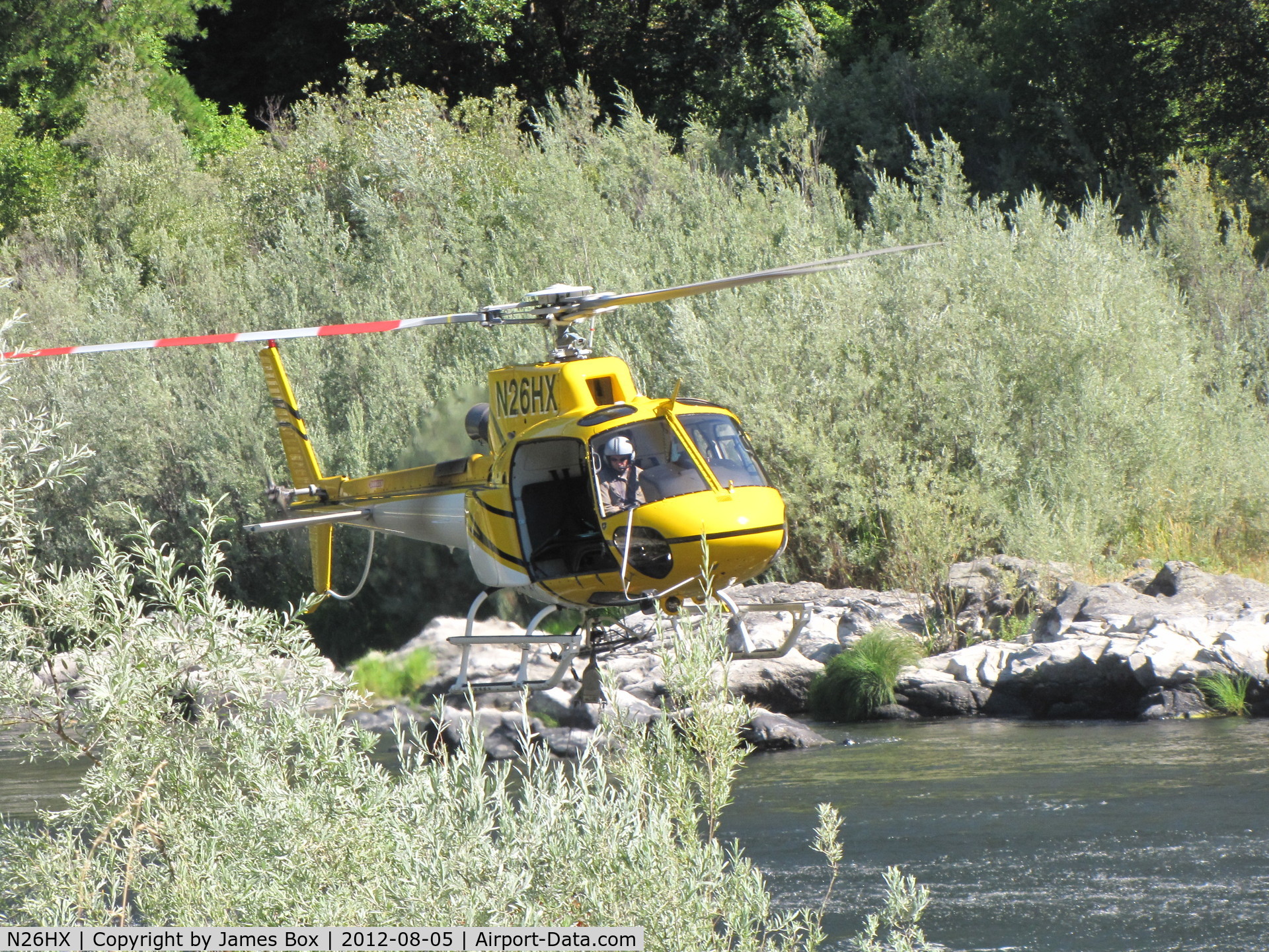 N26HX, 2007 Eurocopter AS-350B-3 Ecureuil Ecureuil C/N 4385, fire fighting in Aug. 2012, taking water from the Klamath River near Seiad, California